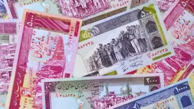İran Cumhuriyeti parası, lira parası, çeşitli banknotların banknotları, finansal işlemler. Tasarımının finansal geçmişi olarak İran parası ve lira.