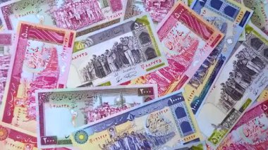 İran Cumhuriyeti parası, lira parası, çeşitli banknotların banknotları, finansal işlemler. Tasarımının finansal geçmişi olarak İran parası ve lira.