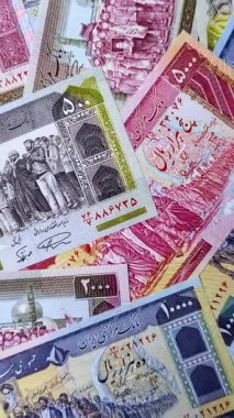 İran parası, lira para birimi, çeşitli banknotlar, finansal işlemler. İran parası