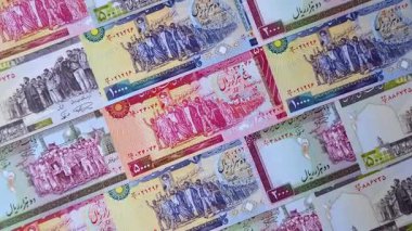 İran Cumhuriyeti parası, lira parası, çeşitli banknotların banknotları, finansal işlemler. Tasarımının finansal geçmişi olarak İran parası ve lira.