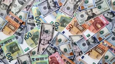 Euro ve dolar banknotları, döviz, satış, ekonomik tarifeler ve vergiler ve vergiler. Tasarımınız için arka plan olarak Euro ve dolar