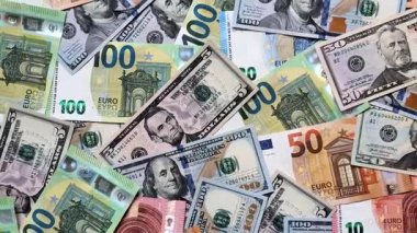 Euro ve dolar banknotları, döviz, satış, ekonomik tarifeler ve vergiler ve vergiler. Tasarımınız için arka plan olarak Euro ve dolar