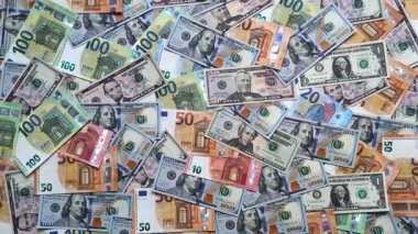 Euro ve dolar banknotları, döviz, satış, ekonomik tarifeler ve vergiler ve vergiler. Tasarımınız için arka plan olarak Euro ve dolar