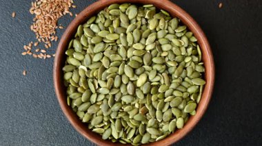 Kabak çekirdeği çekirdekleri, tuzlanmış, kavrulmuş ya da çiğ, sağlıklı bir malzemedir. Tasarımınız için besin kaynağı olarak kabak tohumları