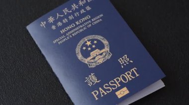 Hong Kong pasaportu, seyahat, boş zaman ve iş belgesi. Tasarımınız için Hong Kong pasaportu.