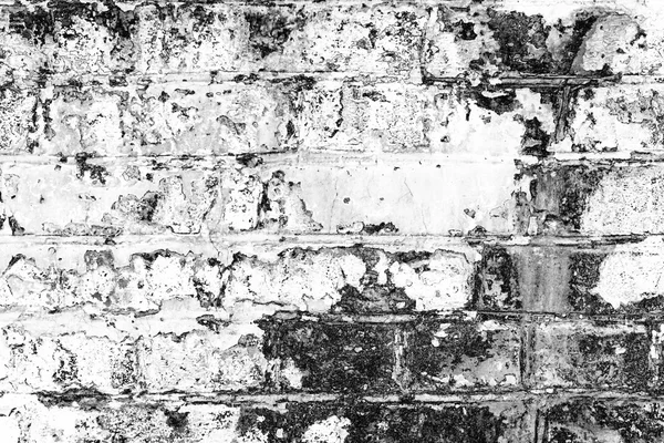 Кирпичная текстура с царапинами и трещинами — стоковое фото