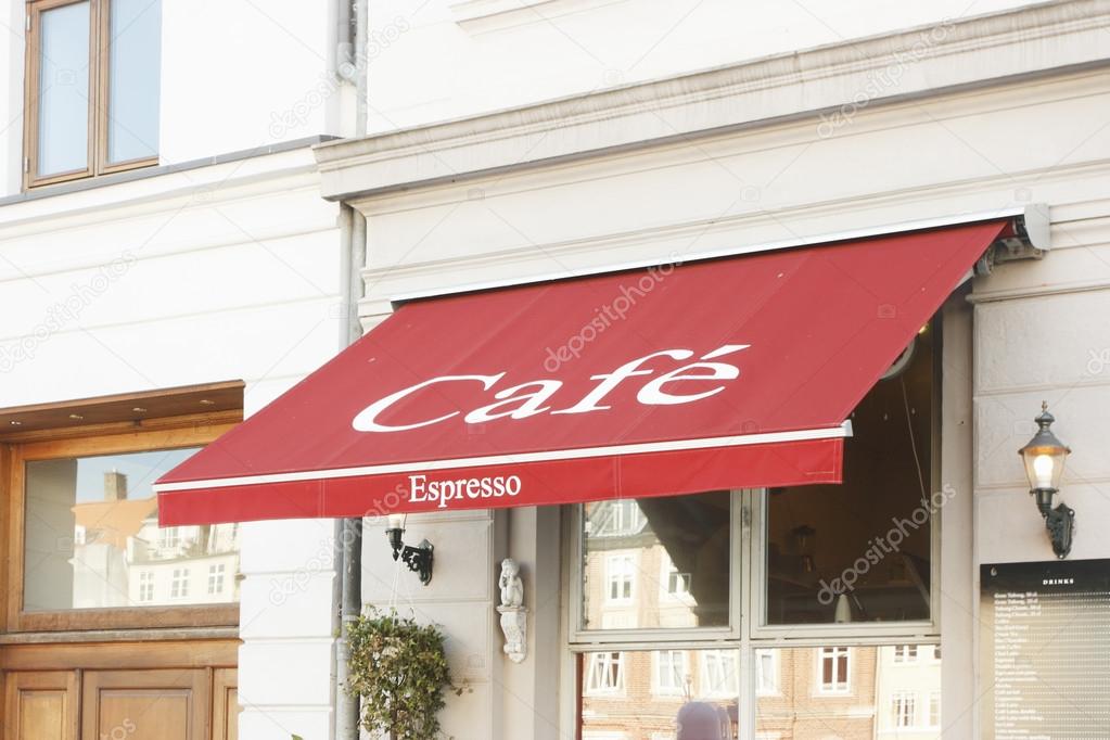 Traditional cafe with red awning