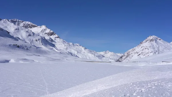 spectacular view of the snow-filled mountains and glaciers Pizza Pal in the Swiss Alps