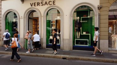 Italy , Milan January 14,2020 - Versace luxury store and showroom in Montenapoleone road fashion district - Tourist visiting downtown after finish of lockdown due Covid-19 Coronavirus