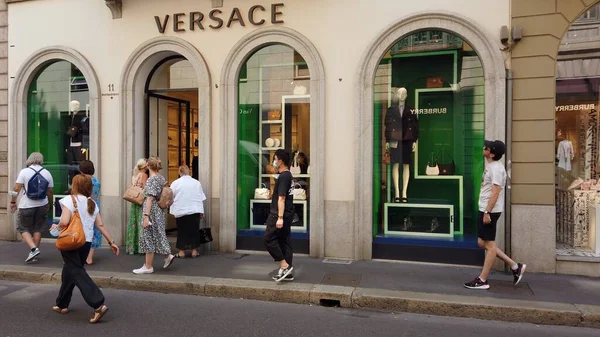 Italy , Milan January 14,2020 - Versace luxury store and showroom in Montenapoleone road fashion district - Tourist visiting downtown after finish of lockdown due Covid-19 Coronavirus