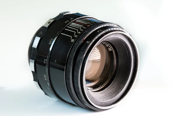 Vintage photo camera lens close up isolated on white background — Stock Photo, Image