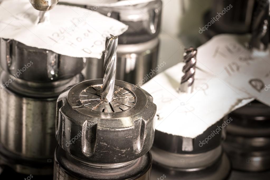 CNC in Rotating head with drill and notes ⬇ Stock Photo, Image