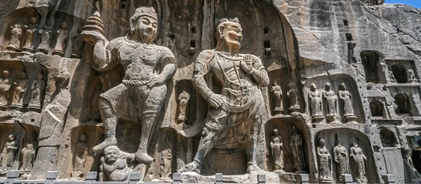 Carved Buddha images at Longmen Caves, Dragon Gate Grottoes — Stock Photo, Image