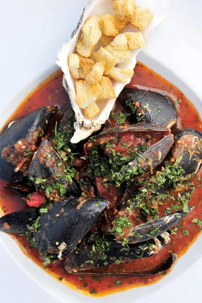 Mussels in tomato sauce — Stock Photo, Image