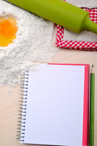 Blank recipe book with egg, flour — Stock Photo, Image