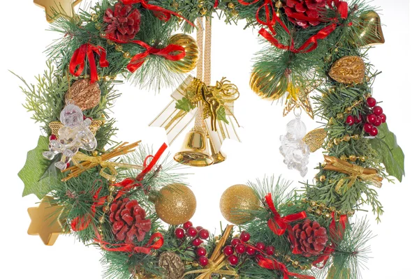 Christmas wreath with golden balls and cones and glass angels and bells and cherub — Stock Photo, Image