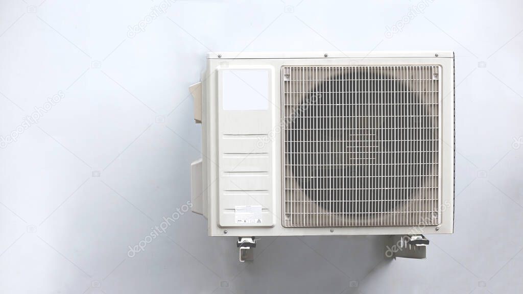 Small air conditioning cooling system wall mounted white cement.