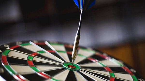 Dart is an opportunity and Dartboard is the target and goal.So both of that represent a challenge in business marketing as concept.