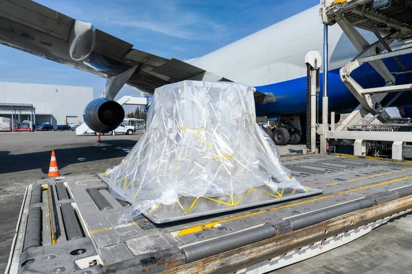 Loading platform of air freight to the aircraft. Loading of cargo to the  aircraft.