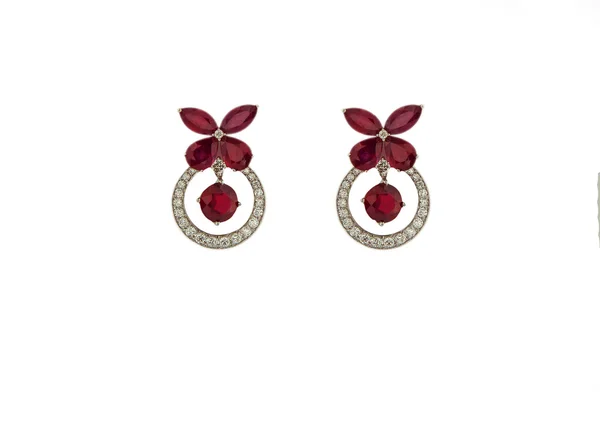 Earrings on a white background — Stock Photo, Image