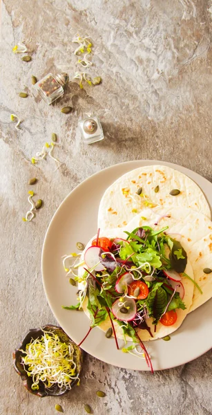 Salad with tomato and radish sprouts for dinner — Stock Photo, Image