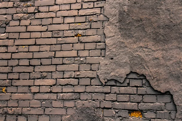 Eski tuğla duvar bir arka planda — Stok fotoğraf