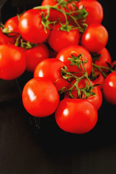 Top view of fresh tomatoes,  isolated on dark background — Stock Photo, Image