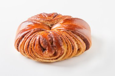 Taze tatlı ev yapımı tarçın rulo. Svedish mutfağı. Hafif ahşap