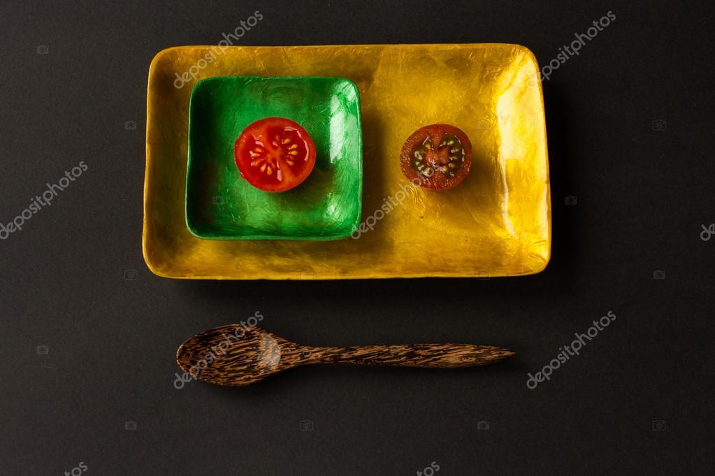 Diet for girls. lettuce and tomato on a platter
