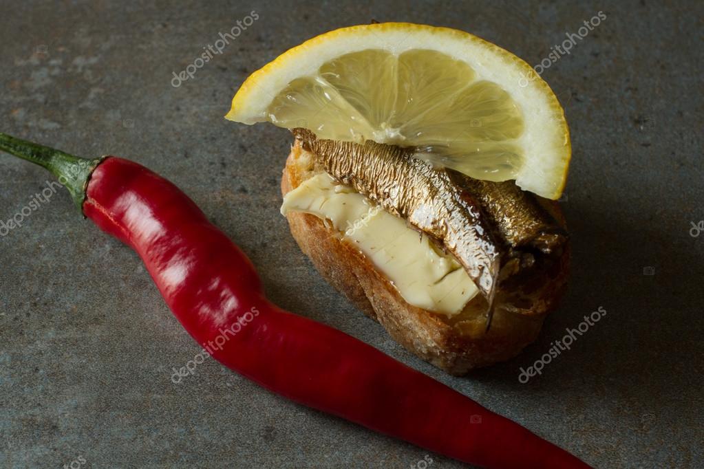 Sandwich with sprats, national food in Russia for the holidays