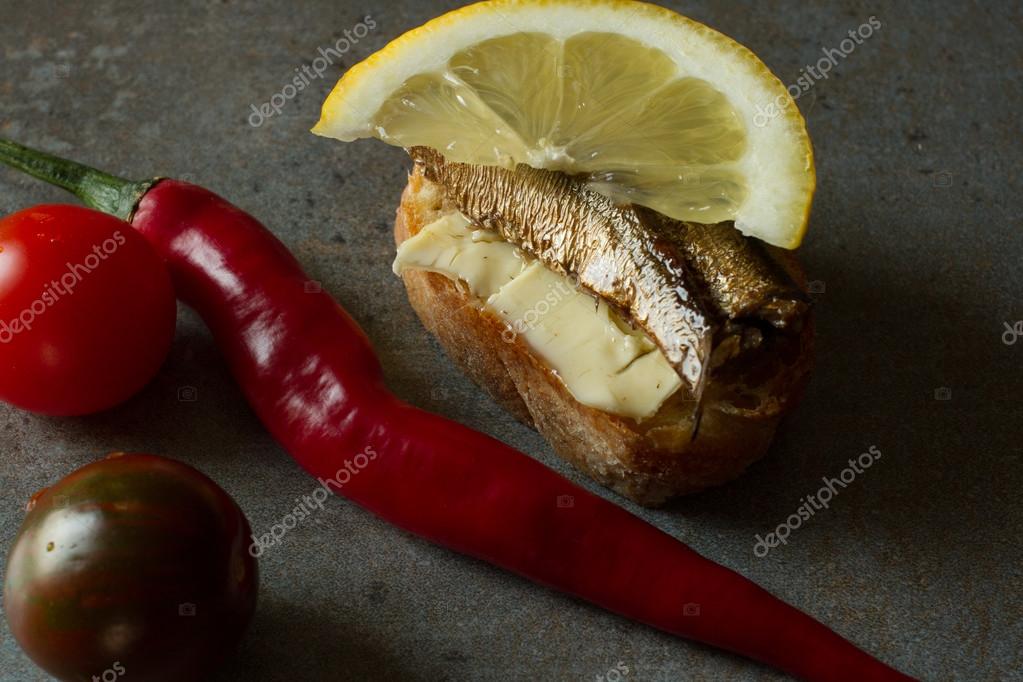 Sandwich with sprats, national food in Russia for the holidays