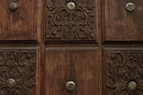 Carved brown wood. interesting work of the old masters — Stock Photo, Image