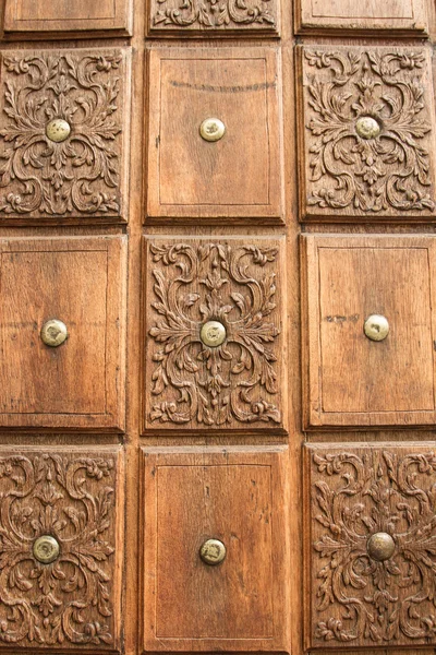 Carved brown wood. interesting work of the old masters — Stock Photo, Image