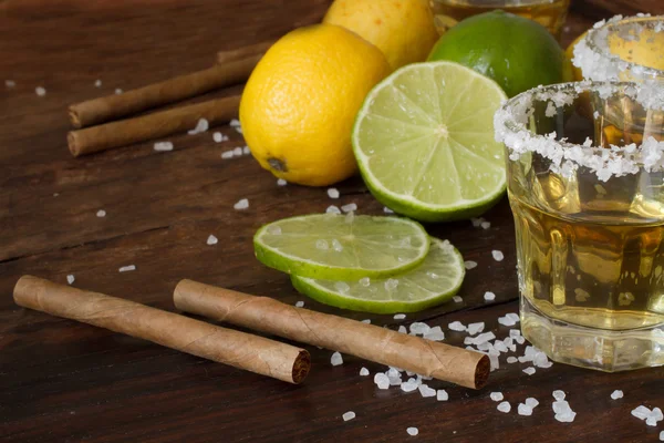 Tequila and lime Lemon and as a cigarillo — ストック写真