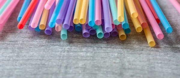 Colored tubules for juice and cocktails — Stock Photo, Image