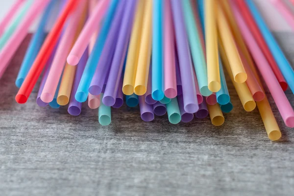 Colored tubules for juice and cocktails — Stock Photo, Image