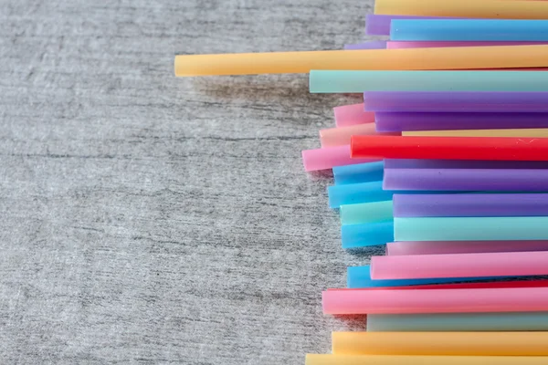 Colored tubules for juice and cocktails — Stock Photo, Image