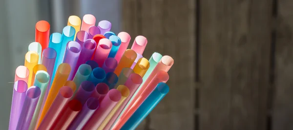 Colored tubules for juice and cocktails — Stock Photo, Image