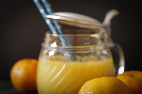 Orange juice with mint leaves — Stock Photo, Image