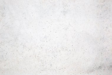 Beton duvara pankart yerleştirmek için kullanılan eski bir duvar gibi doğal çimento veya taş dokunun beyaz beton dokusu..