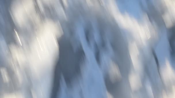 Abstract background of ice and snow moving quickly through frame — Stock Video