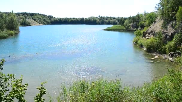 Beautiful lake and light blue water in summer — Stock Video