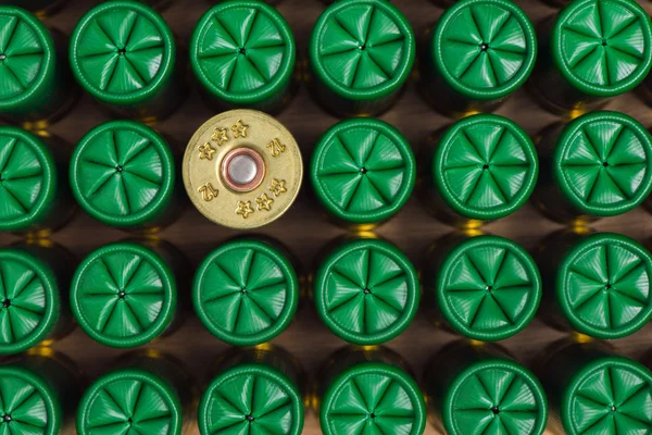Background from green hunting cartridges — Stock Photo, Image