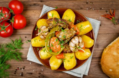 Slow-cooked stew with tender lamb meat, potatoes and vegetables clipart
