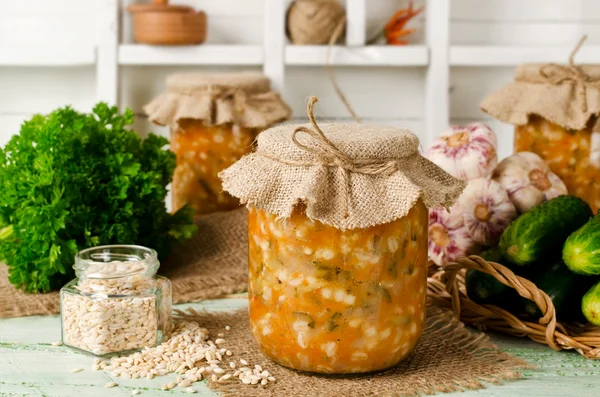 Soup in a jar. Pickle from barley and cucumber — Stock Photo, Image
