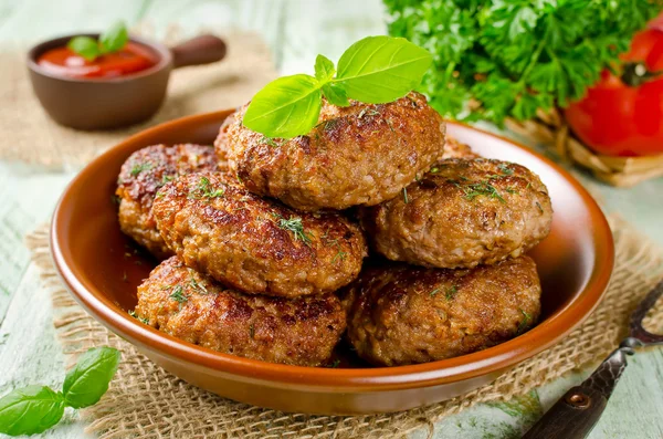 Juicy delicious cutlets with oatmeal. Rustic style — Stock Photo, Image