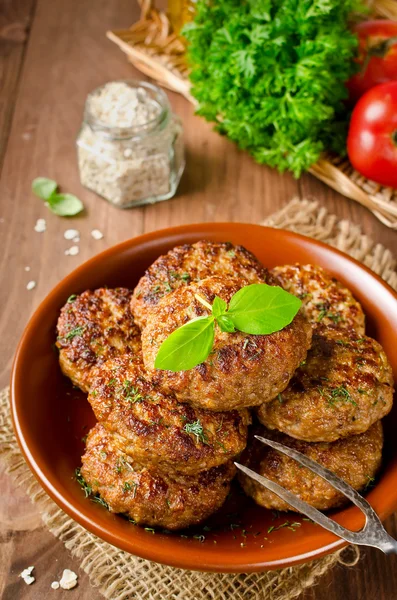 Juicy delicious cutlets with oatmeal. Rustic style — Stock Photo, Image