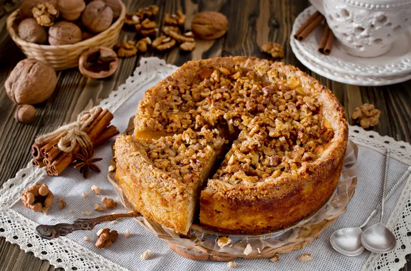 Piece of apple pie with walnut and sugar glaze — Stock Photo, Image