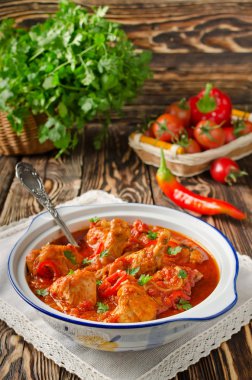 Chakhokhbili - chicken stewed with tomatoes clipart