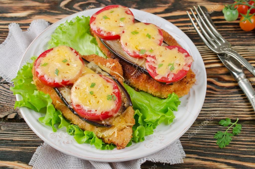 куриное филе с помидорами и сыром в духовке. куриные отбивные с сыром и помидорами. куриные отбивные в духовке с помидорами и сыром. куриные отбивные в духовке с помидорами и сыром. отбивная куриная грудка с помидорами и сыром в духовке.